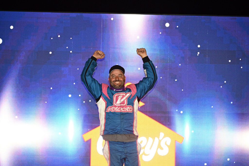 Jimmy Gustin celebrated a $1,500 Friesen Performance IMCA Modified feature win during the Saturday Double Down Prelude at Boone Speedway. (Photo by Tom Macht, www.photofinishphotos.com)