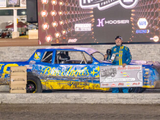 Brandon Nielsen of Spencer, celebrates in victory lane after winning the Sunoco IMCA Hobby Stock Qualifier 3 on Sept. 2 during the Speedway Motors IMCA Super Nationals fueled by Casey’s at Boone Speedway. (Photo by Byron Fichter Fotography)