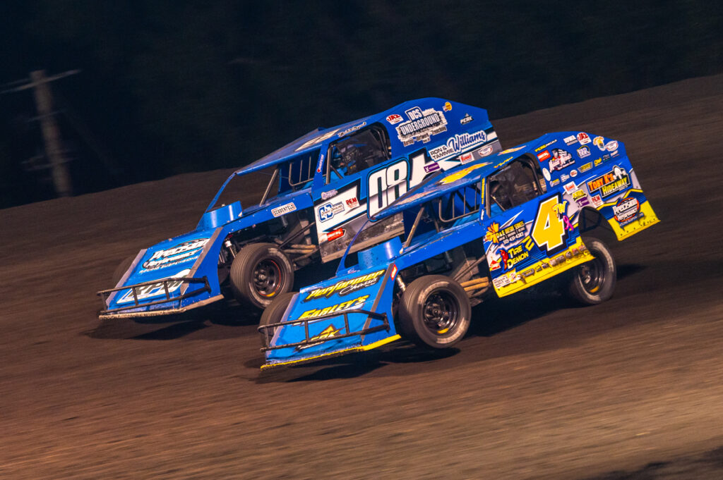 Dakota Sproul (08) and Tim Ward (4TW) battle for the lead during the Friesen Performance IMCA Modified Big Dance on Sept. 6 at Boone Speedway during the Speedway Motors IMCA Super Nationals fueled by Casey’s. (Photo by Byron Fichter Fotography)