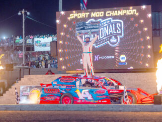 Jake Sachau stood atop his car in victory lane after earning his second career Karl Chevrolet IMCA Northern SportMod Super Nationals championship in the Big Dance on Sept. 6 at Boone Speedway during the Speedway Motors IMCA Super Nationals fueled by Casey’s. (Photo by Byron Fichter Fotography)